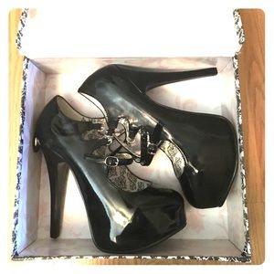 Black platform pumps